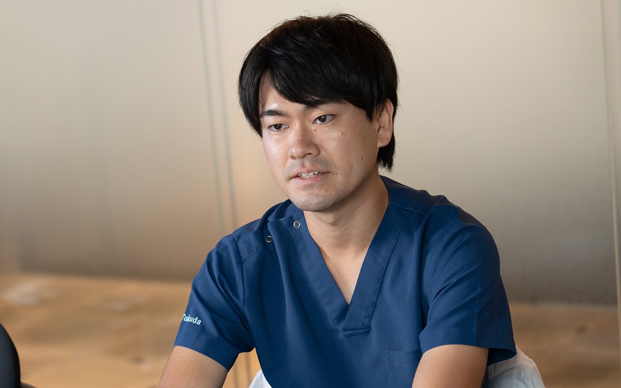 インタビューに答える徳田充宏さん