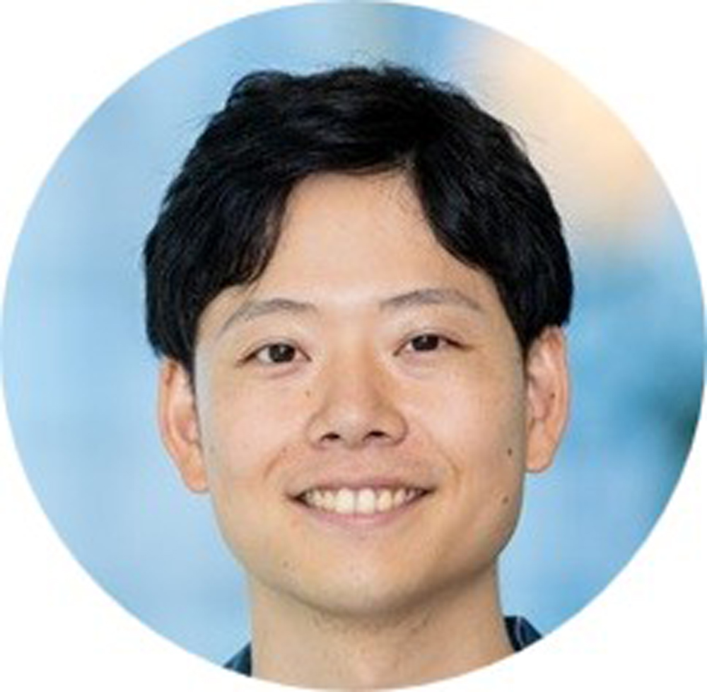 この記事のインタビュイーである材木の顔写真。笑顔で正面をむいてほほ笑んでいる